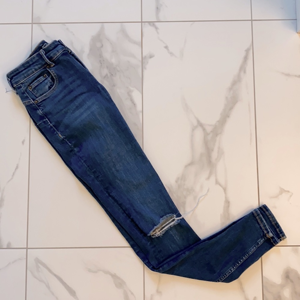 Dark Wash Buttlifting Skinny Jeans.